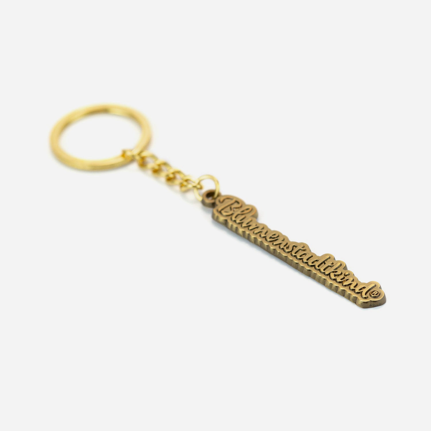 12cm Schlüsselanhänger Blumenstadtkind antik gold liegend