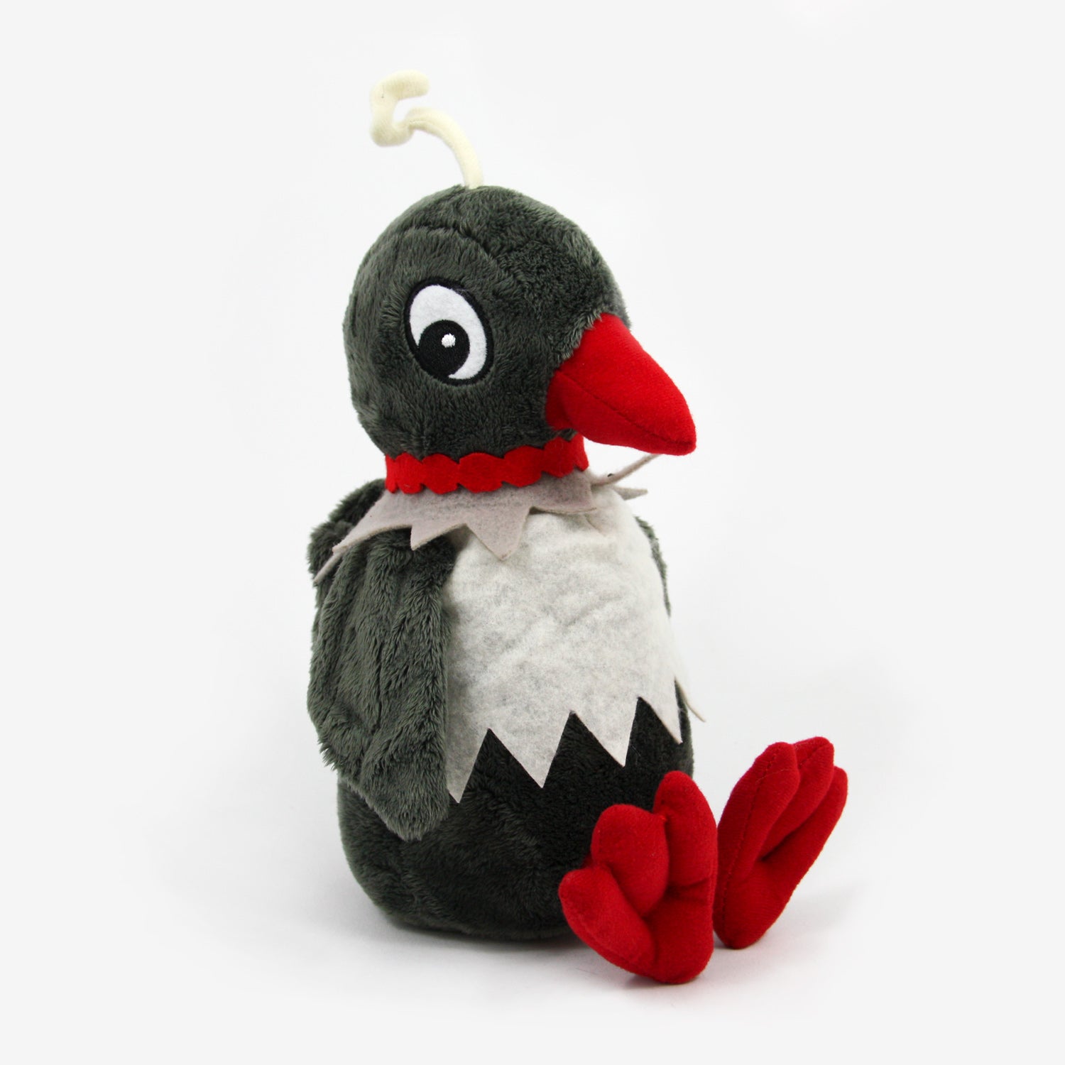 Seitenansicht Kuscheltier Frau Elster aus der Serie "Unser Sandmännchen" sitzend